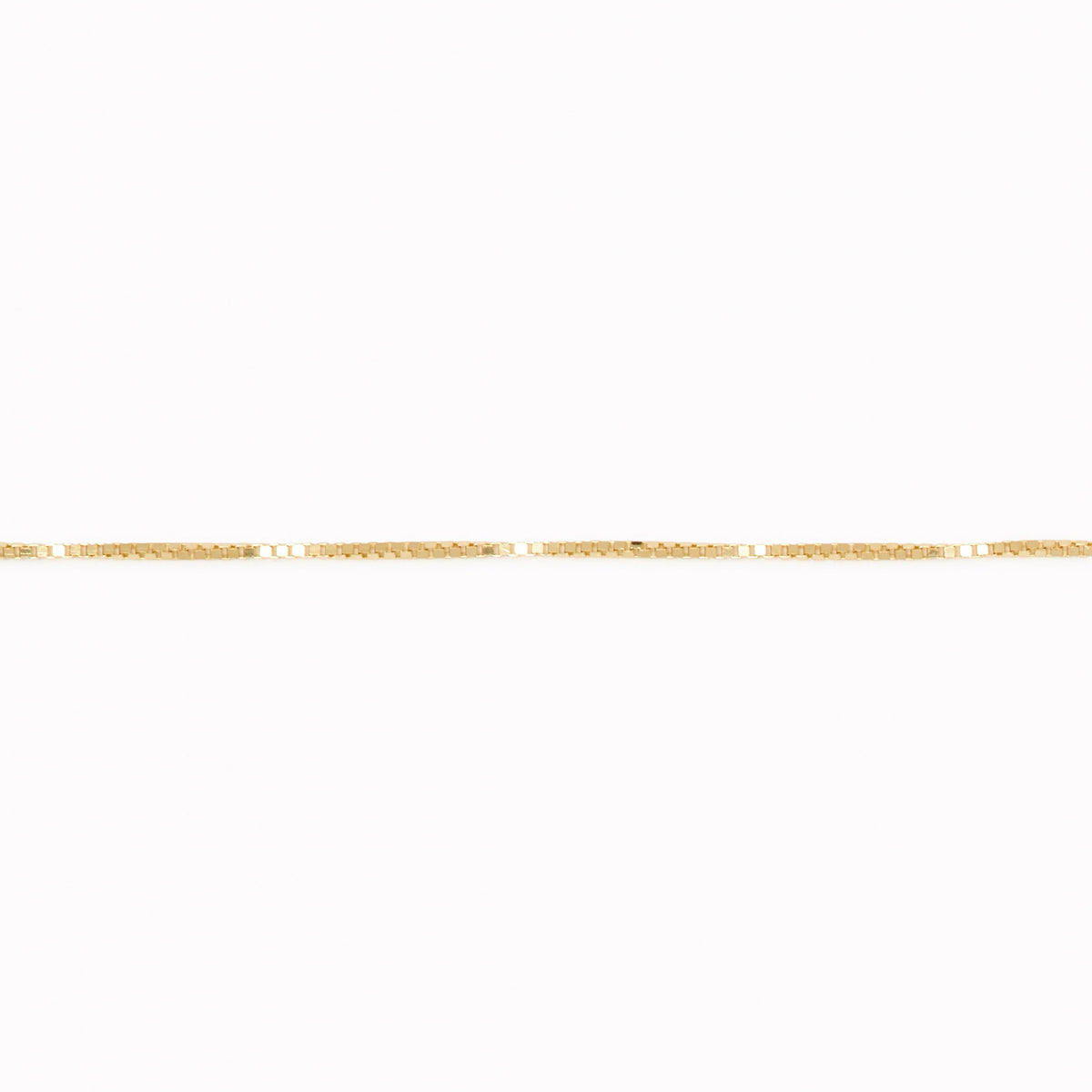 14k gold box chain necklace with a sleek, minimalistic design displayed on a clean white background