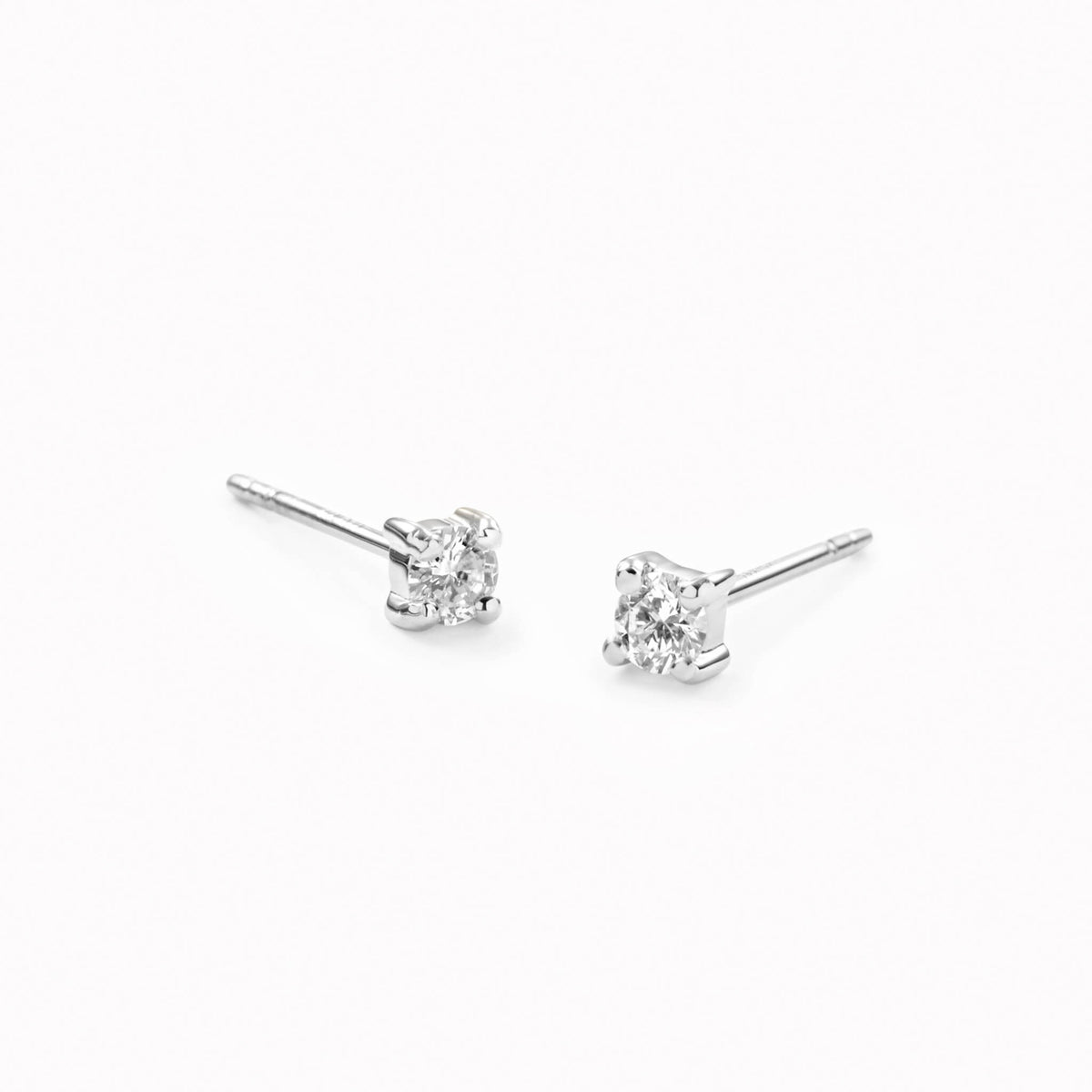 Pair of 14k White Gold Diamond Stud Earrings 2.5mm - Aria with prong-set lab grown diamonds on white background