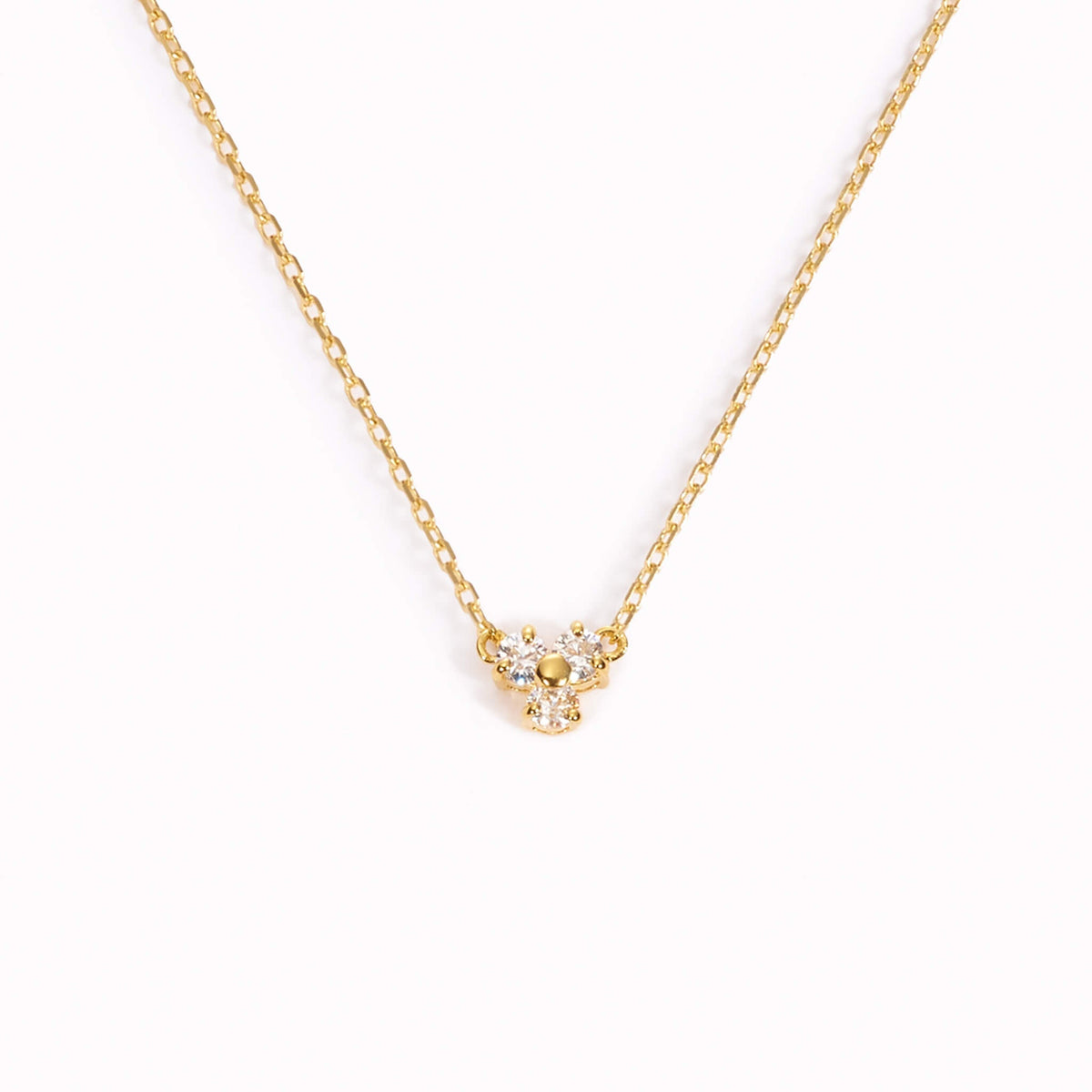 Gold pendant necklace with three cubic zirconia gemstones 