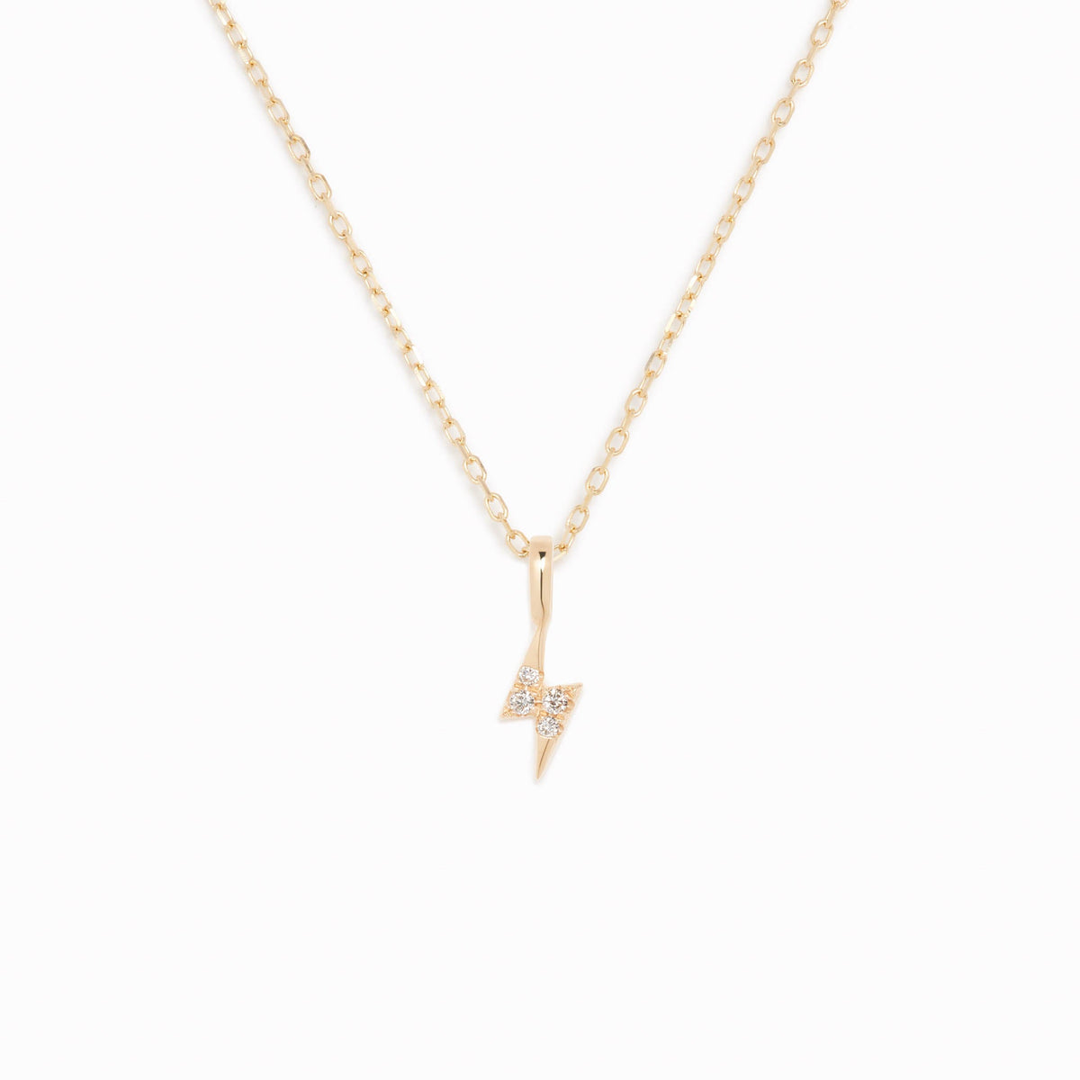Diamond Lightning Bolt Charm 14k Gold with round diamonds on a delicate yellow gold chain on a white background