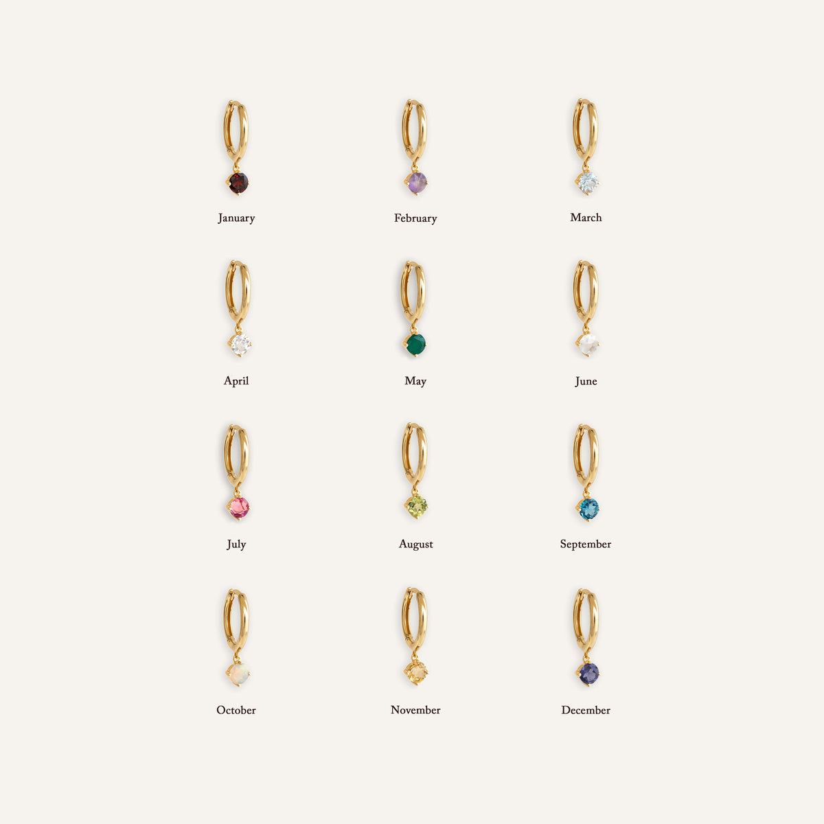 Display of twelve birthstone drop huggie earrings with October Birthstone Drop Huggie Earrings - Opal highlighted in gold vermeil setting