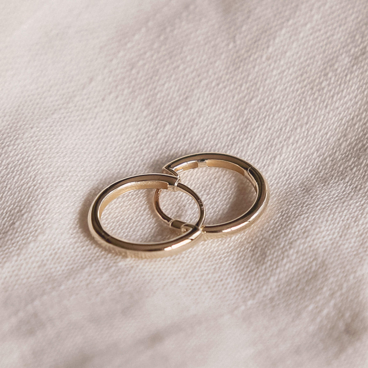 Huggie earrings handcrafted in 14k gold