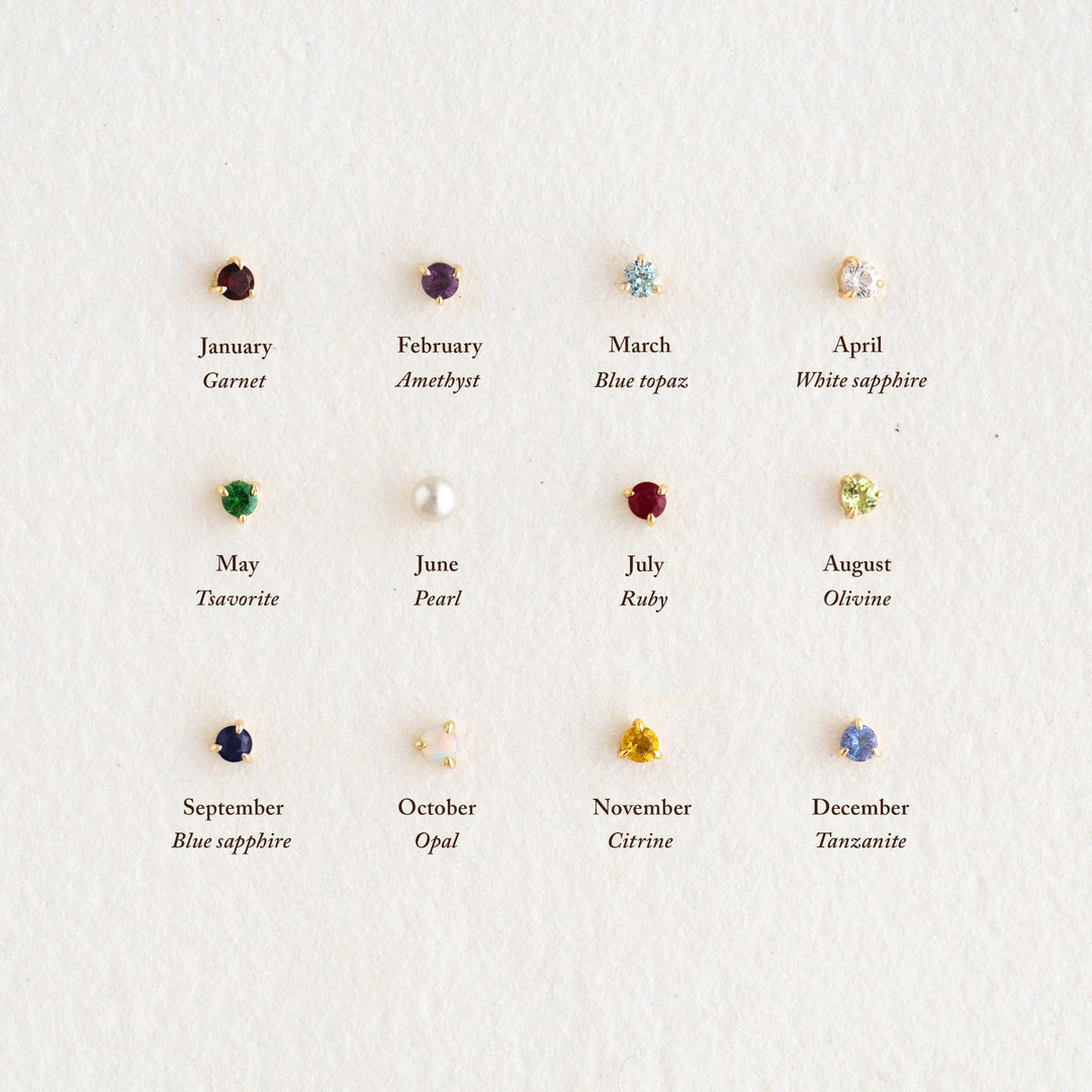 November Birthstone Stud Earrings 14k Gold - Citrine surrounded by other birthstone stud earrings arranged on white background