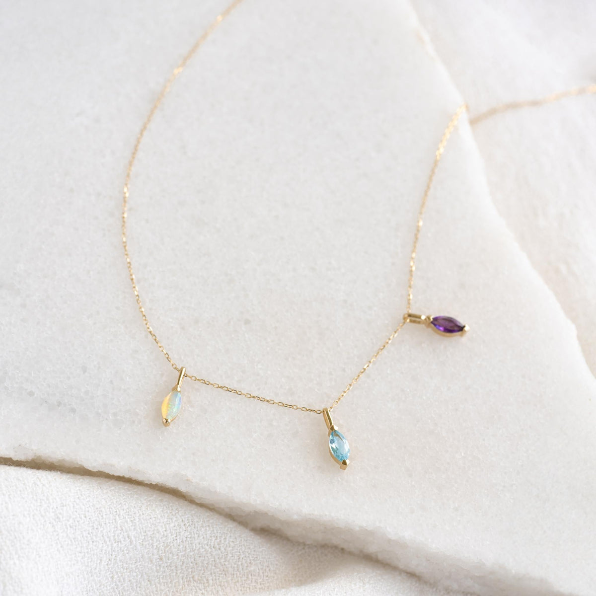 February Birthstone Pendant 14k Gold - Amethyst with delicate marquise-cut gemstones on a fine gold chain