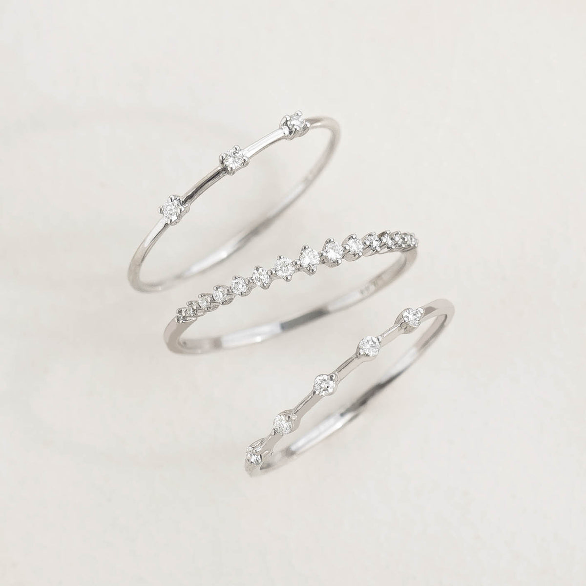 Three Stone Diamond Ring White Gold - Estelle featuring three lab grown diamonds on a delicate 14k white gold band