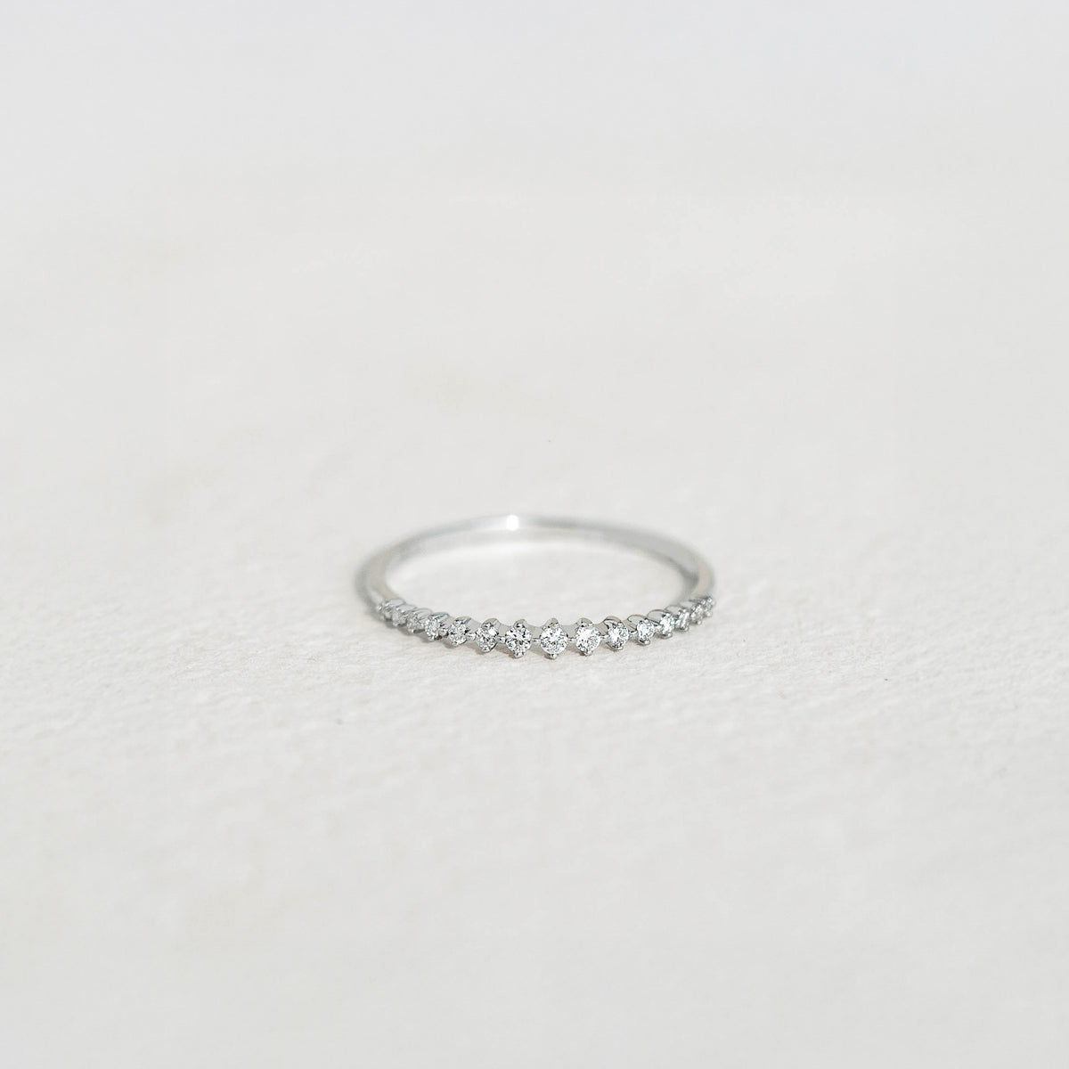 Graduated Diamond Ring White Gold - Ophelia with 15 lab grown diamonds on a 14k white gold band on a light background
