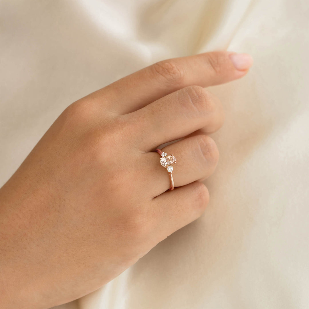 Morganite and Diamond Ring Rose Gold - Kindra worn on hand against a soft cream fabric background