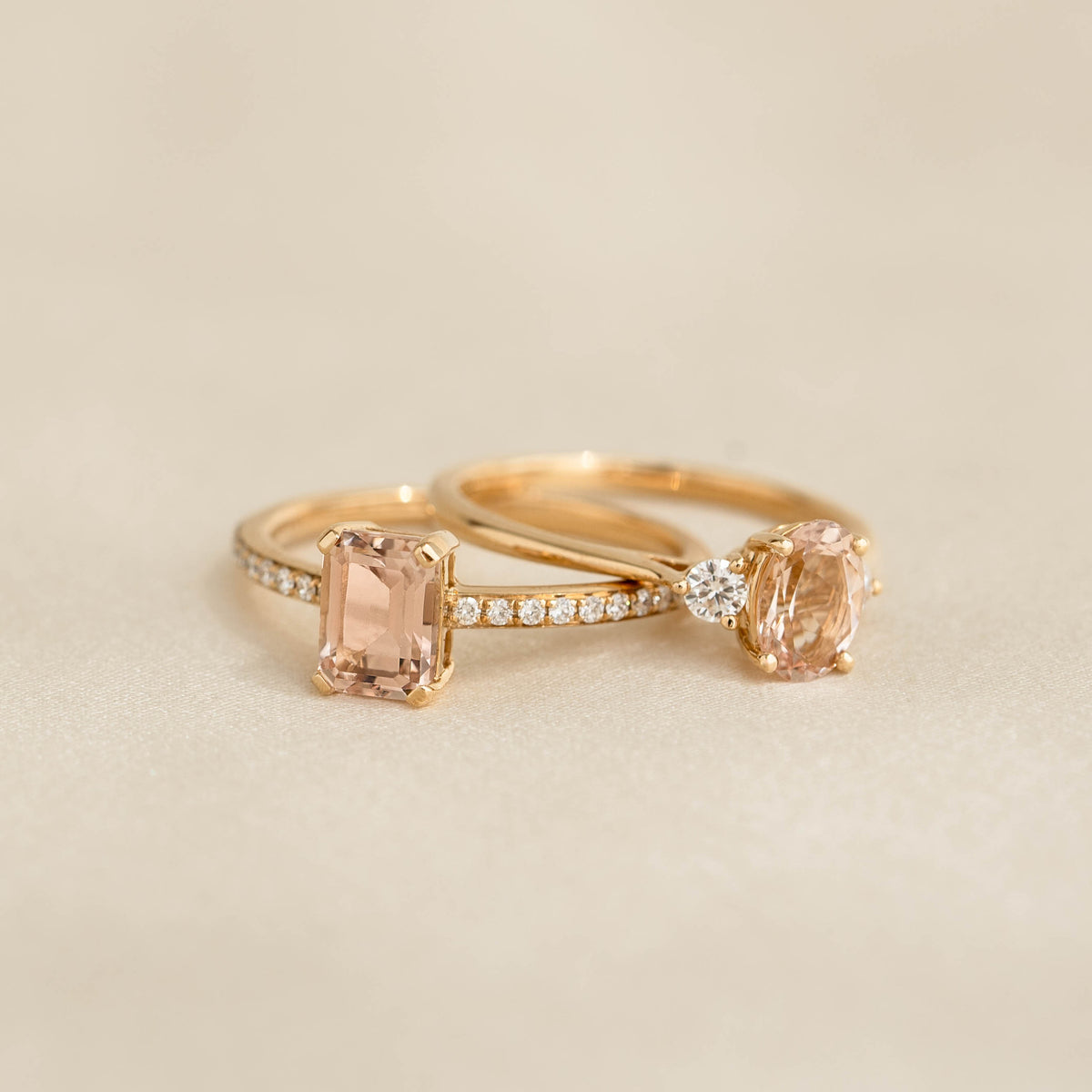 Close-up of two Baguette Morganite and Diamond Ring 14k Gold - Safiya rings with morganite stones and diamond accents on a neutral background