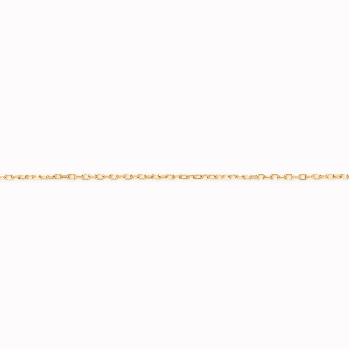 Delicate 14k gold cable chain necklace in 16 inches displayed horizontally on a white background