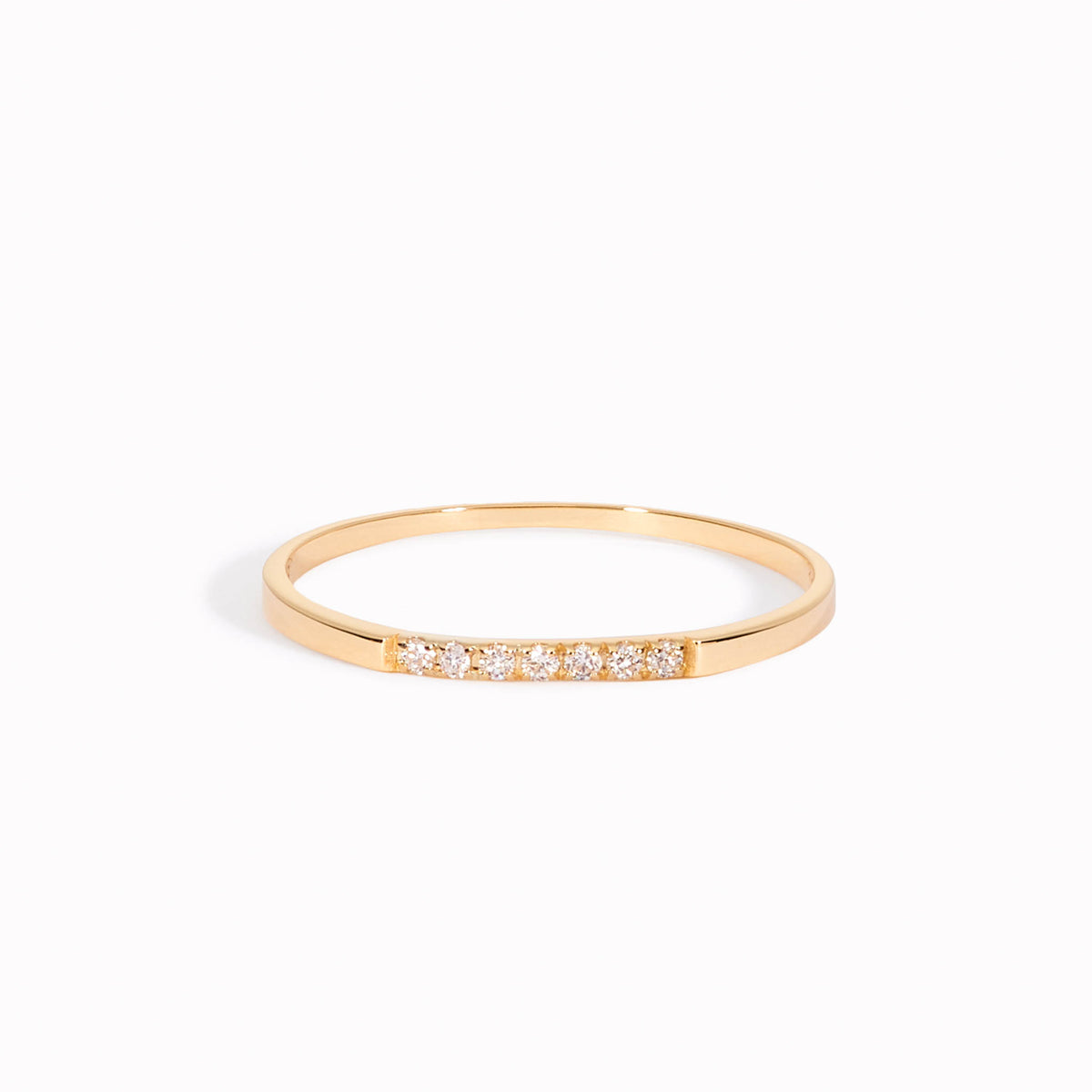 Half eternity ring with pave lab grown diamonds on a 14k gold band 
