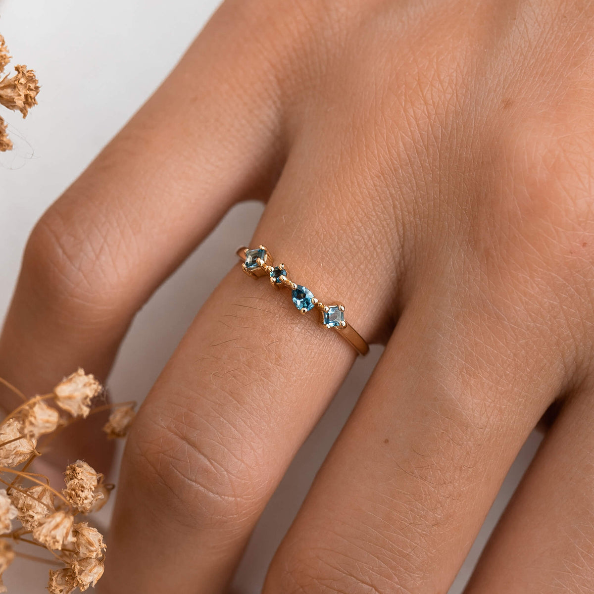 Irregular gemstone ring with London Blue Topaz in 14k yellow gold
