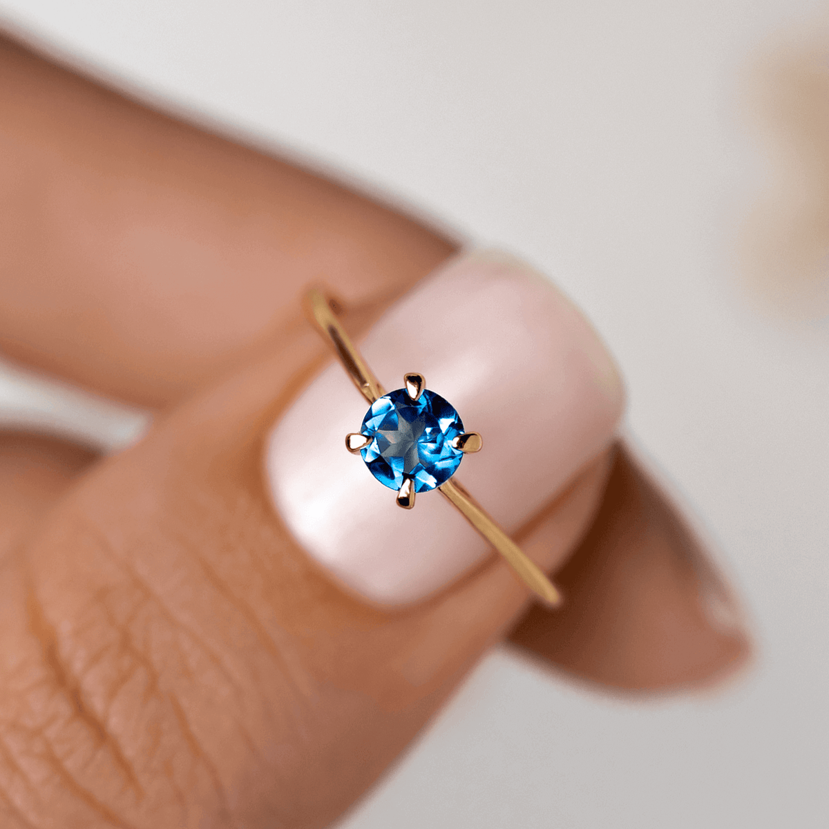 Blue gemstone ring in gold